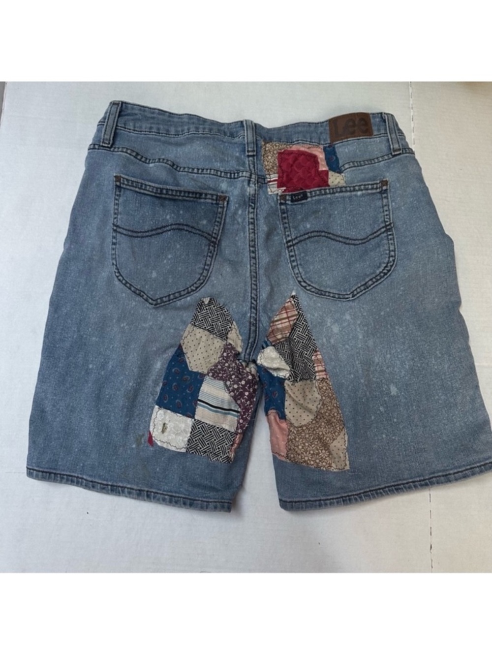 Vintage Lee jean shorts women’s Jorts high waist patched 34”